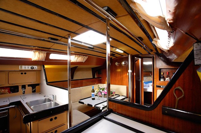 Santorini Oia: Private Sailing Yacht Cruise with Meal and Drinks - The crew can shape the day