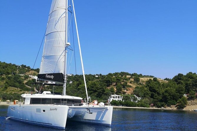 Santorini Oia: Private Sunset Catamaran Cruise with BBQ & Drinks - Starting near Oia and getting settled onboard