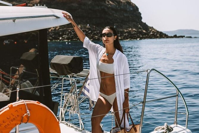 Santorini Oia: Private Sunset Catamaran Cruise with BBQ & Drinks - Old ports and the final Santorini sunset