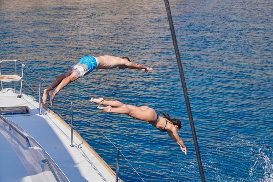 Santorini: Platinum Catamaran Cruise w/ BBQ Meal & Open Bar - Food, drinks, and the value of $117