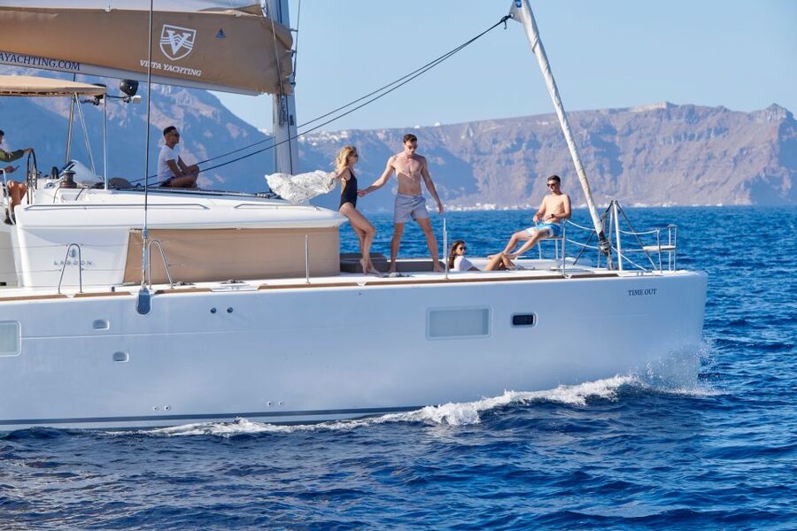 Santorini: Platinum Catamaran Cruise w/ BBQ Meal & Open Bar - Mesa Pigadia and the volcanic coast