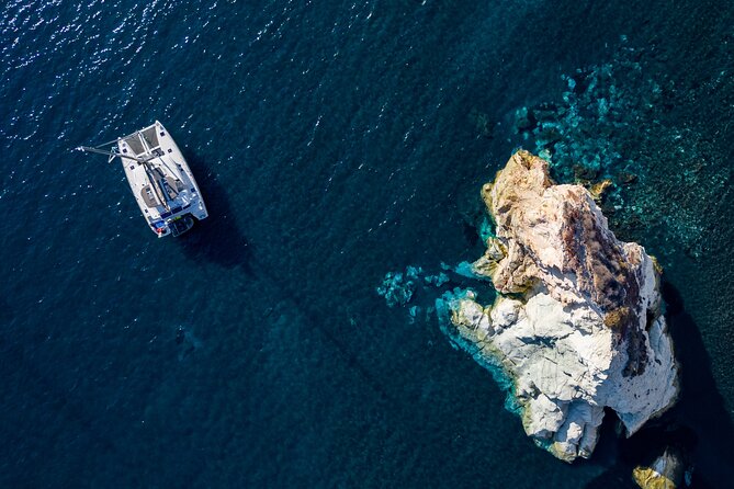 Santorini Platinum Catamaran Cruise with Meal, BBQ and Open Bar - Why seeing Santorini from a catamaran matters