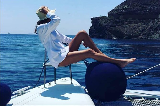 Santorini Platinum Catamaran Cruise with Meal, BBQ and Open Bar - Mesa Pigadia: the first real swimming stop