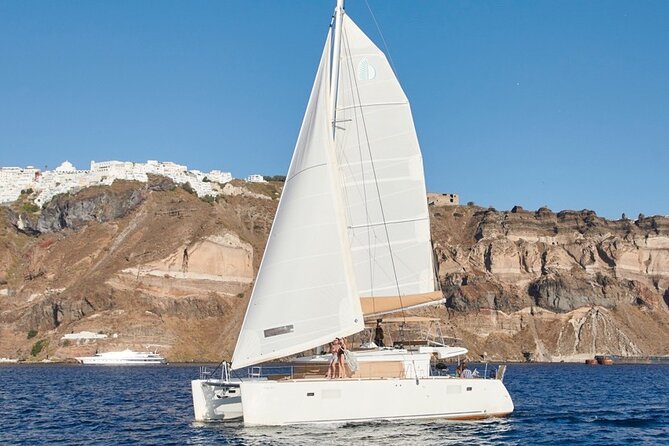 Santorini Platinum Catamaran Cruise with Meal, BBQ and Open Bar - Starting at Vlichada and reaching Red Beach