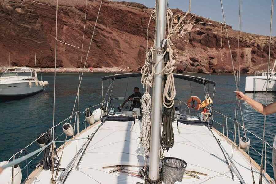 Santorini: Private 5-Hour Sunset Sailing Tour with Dinner - Passing the Lighthouse and Entering the Caldera