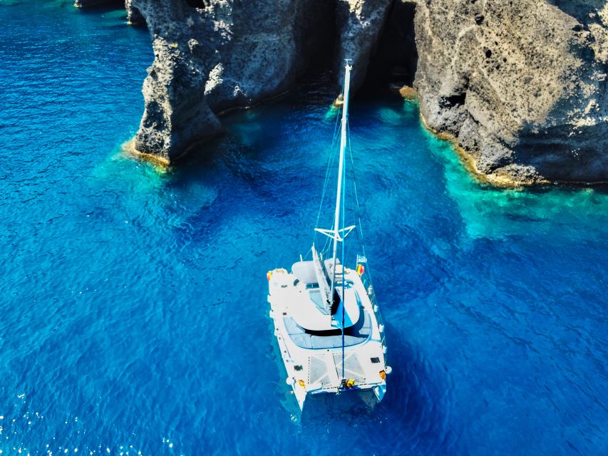 Santorini: Private All-In Catamaran Cruise, with Food|Drinks - Nea Kameni hot springs, snorkeling, and lunch