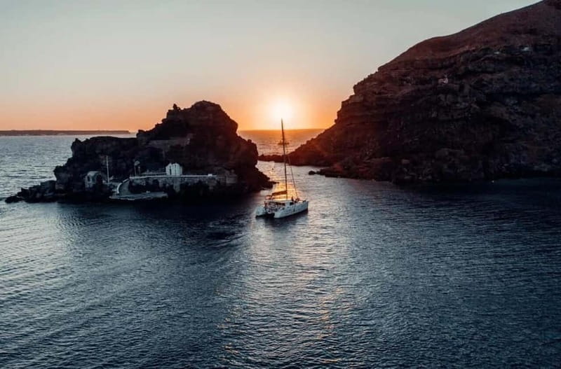 Santorini: Private Catamaran Cruise with BBQ Meal and Drinks - Starting at Ammoudi Bay beneath the cliffs