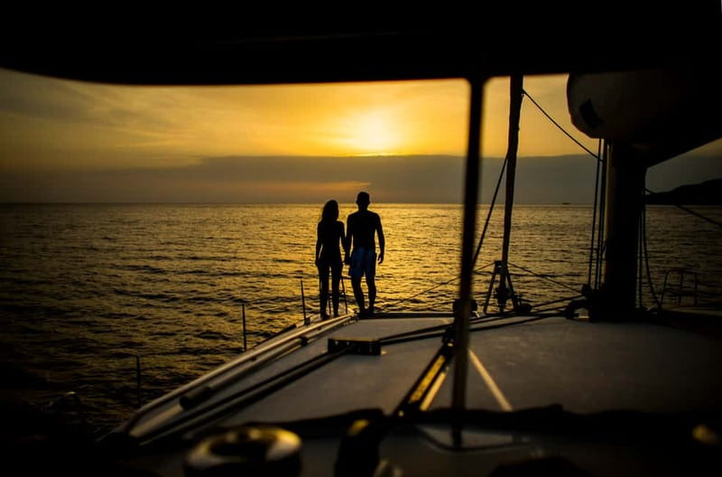 Santorini: Private Catamaran Cruise with BBQ Meal and Drinks - Red Beach, White Beach, and Mesa Pigadia