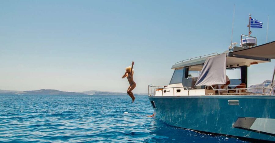 Santorini: Private Diamond 36 Motor Yacht Caldera Cruise - A Greek meal served on the yacht
