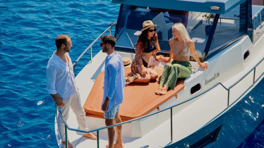 Santorini: Private Diamond 36 Motor Yacht Caldera Cruise - Sunset from the Aegean