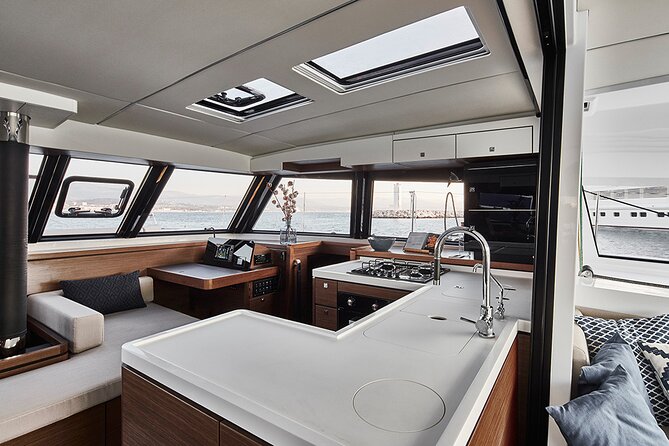 Santorini Private Tour Half-Day Sailing Platinum Catamaran Cruise - Aspronisi and the volcanic story