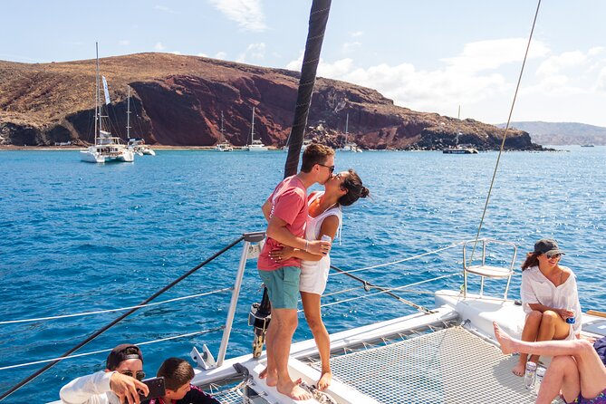 Santorini Sailing Catamaran Daily Cruises w/ Greek BBQ @Thirasia - Setting out from Vlychada Marina