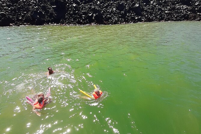 Santorini Semi-private Morning or Sunset Volcano Sailing Tour - Red Beach: dramatic color, limited time