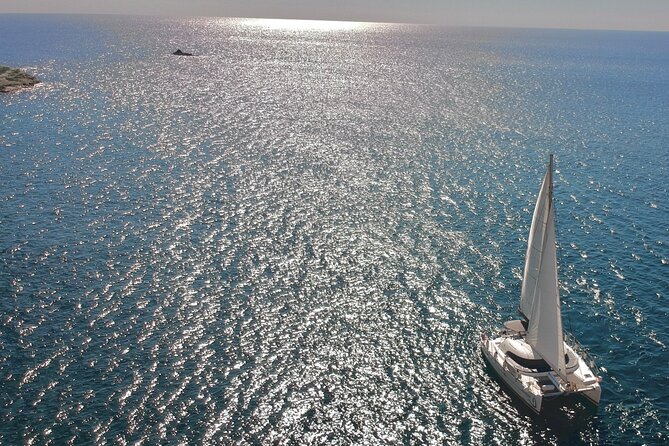 Santorini: Standard Small-Group Catamaran Cruise with Food/Drinks - The sunset option earns its extra attention