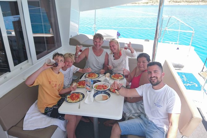 Shared Catamaran All inclusive-Day Cruise to Naxos or Paros - Lunch from the little galley