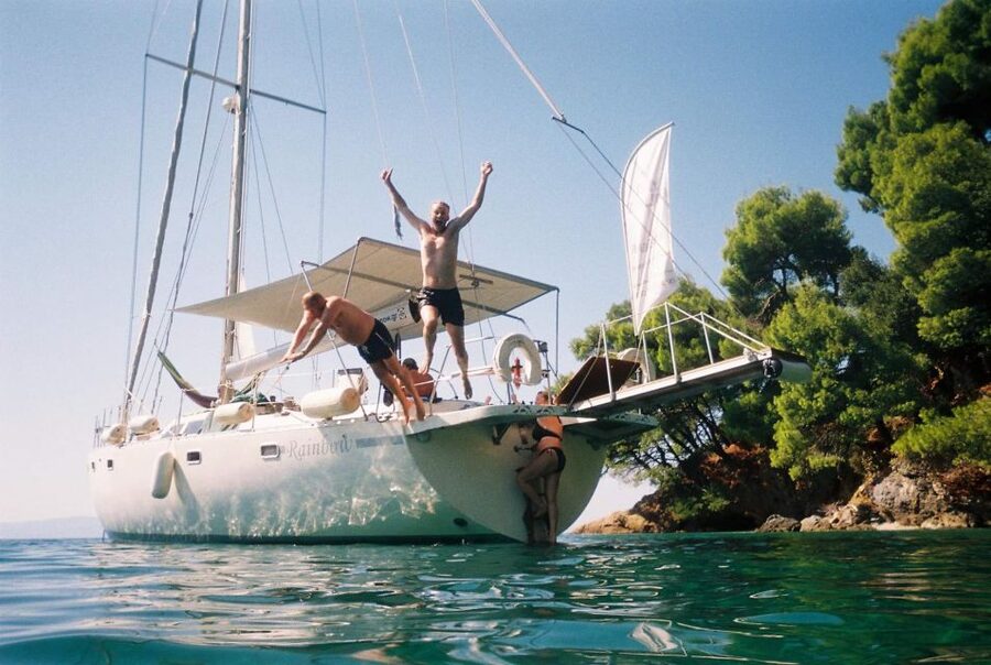 Skiathos: Day-Sailing Tour with Lunch on Board - Snorkeling and paddleboarding without extra rental fees