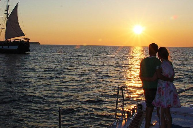 Sunset Sailing Catamaran Cruise in Santorini with BBQ and Drinks - From your hotel to Ammoudi or Athinios Port