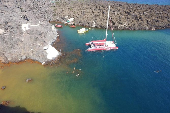Sunset Sailing Catamaran Cruise in Santorini with BBQ and Drinks - Food, drinks, shade, and comfort on board