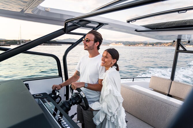 The Fastest Private Motor Yacht in Santorini - All Inclusive Tour - The Akrotiri lighthouse and caldera cliffs